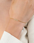 ZINZI gold plated zilveren armband met Infinity teken met witte zirkonia's 17-19cm ZIA2597Y